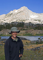 Greg Cope posing in front of North Peak in Twenty Lakes Basin