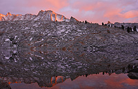 Incredible sunset alpenglow and pink and red light reflected in a lake